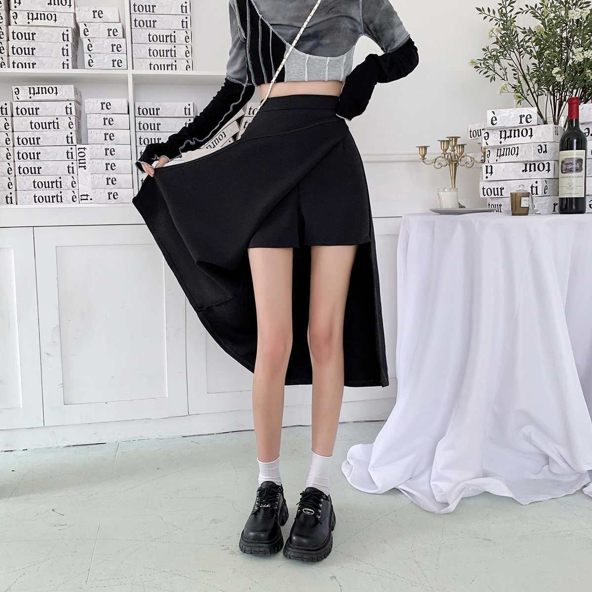 Chic black high-waist A-line skirt.