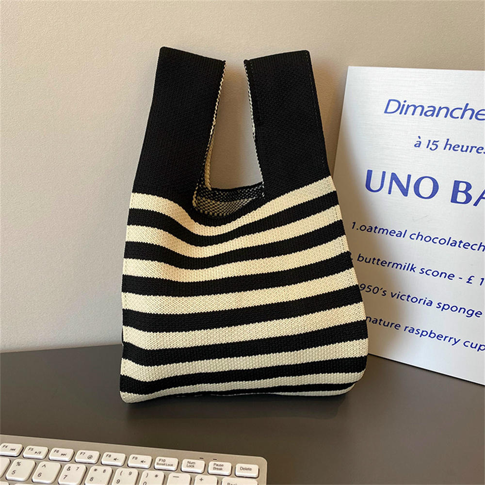 Polka dot stripe knit handbag.