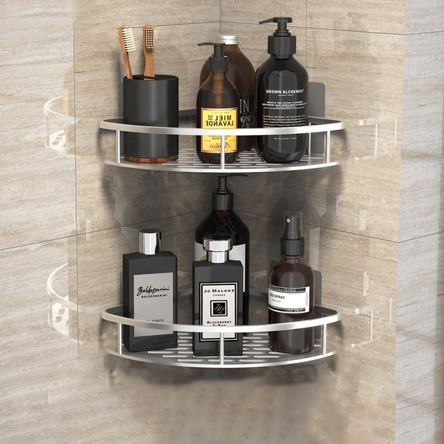 Wall-mounted corner shelf for bathroom.