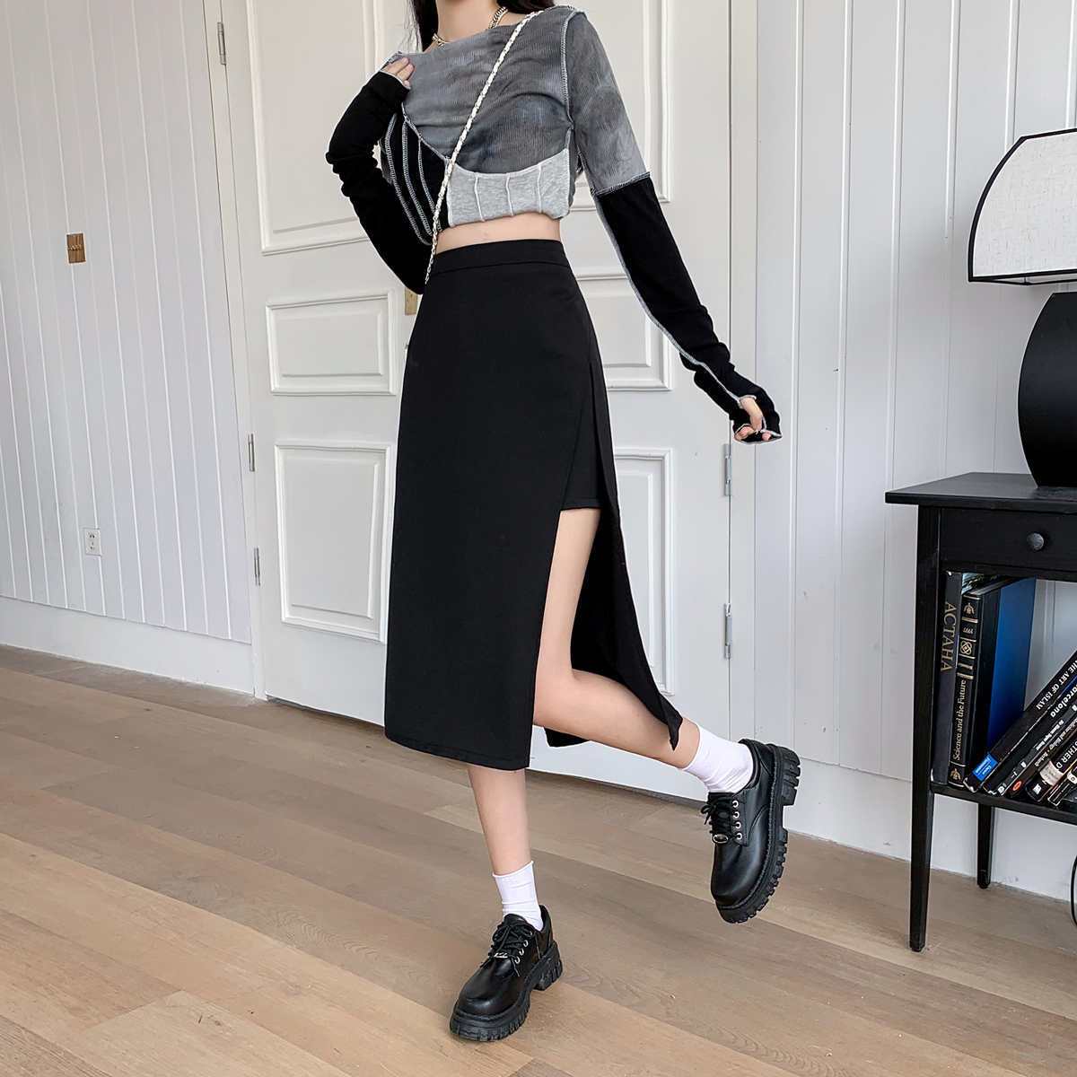 Chic black high-waist A-line skirt.