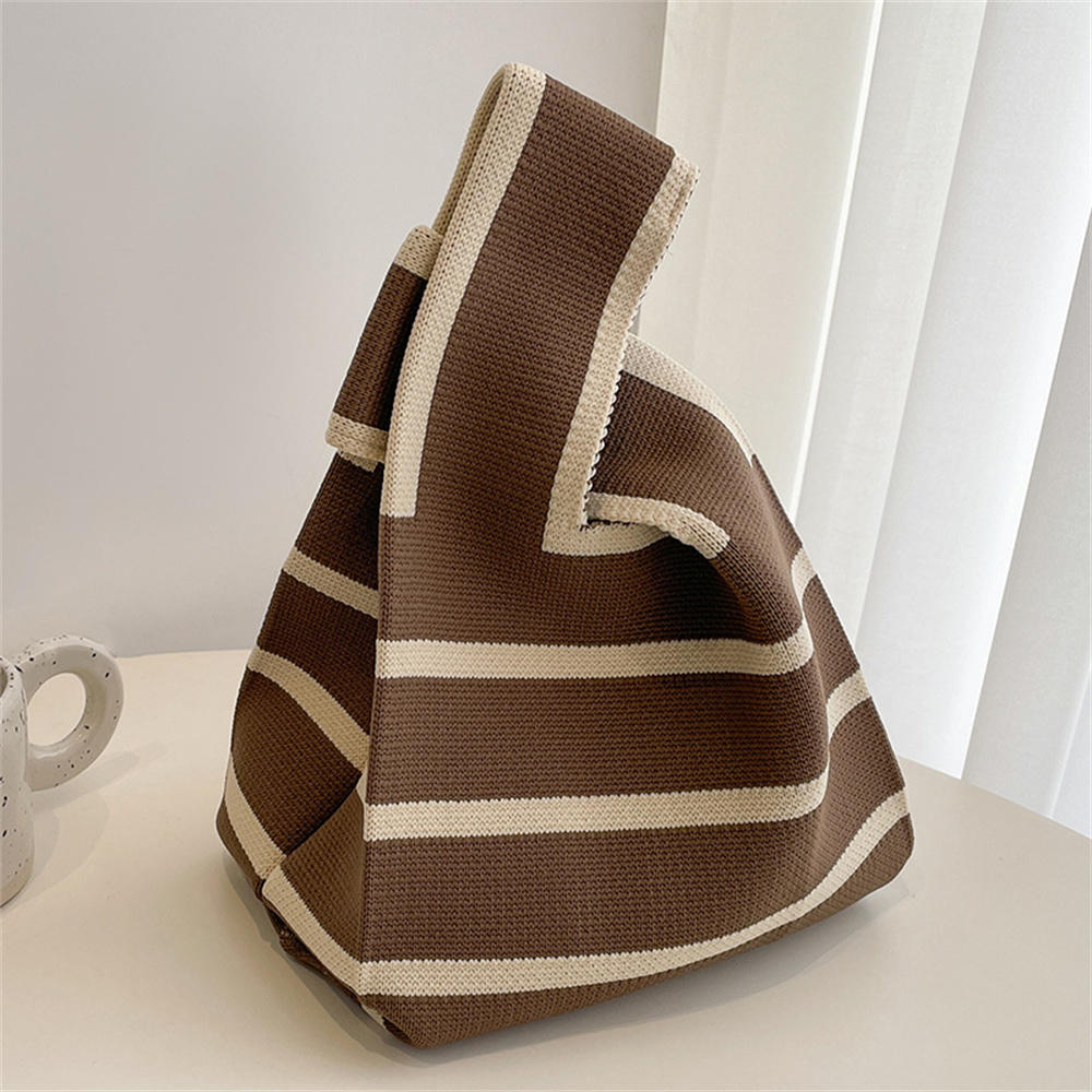 Polka dot stripe knit handbag.