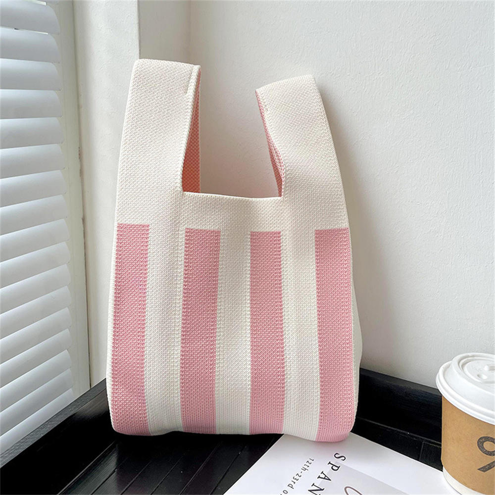 Polka dot stripe knit handbag.