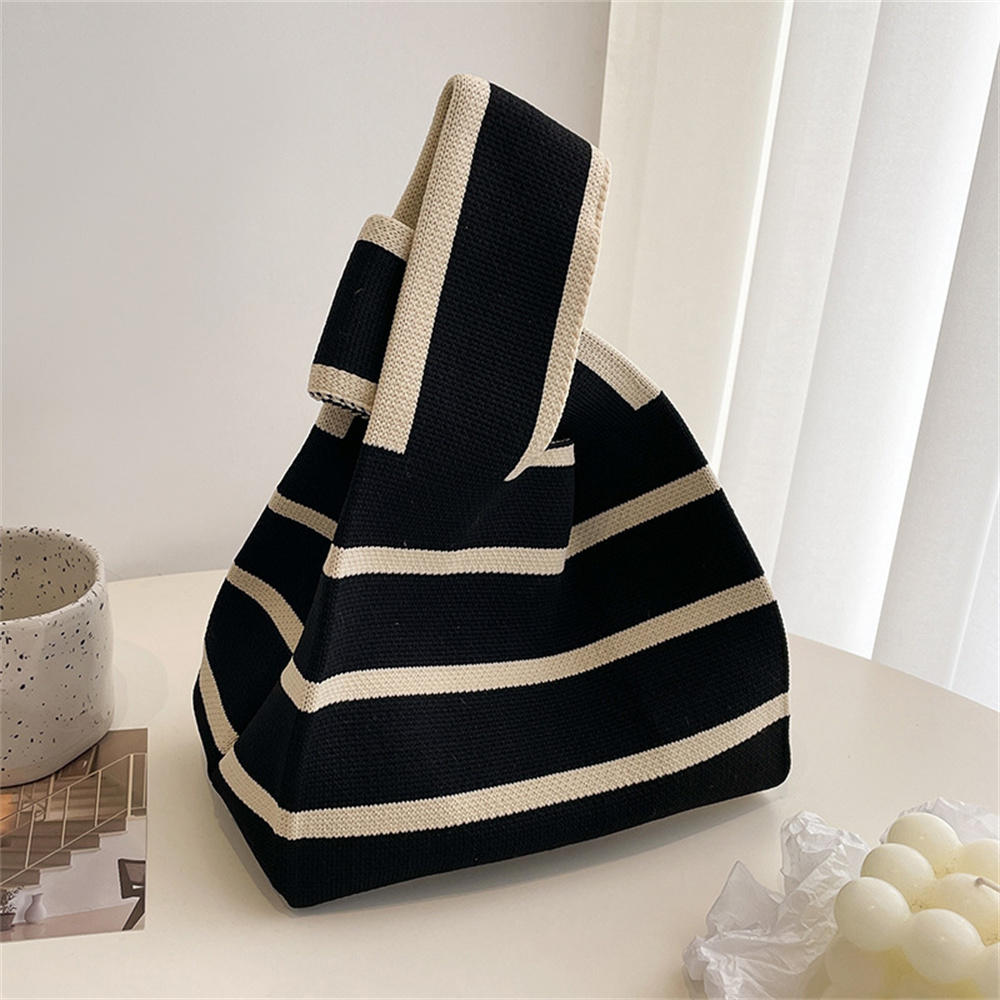 Polka dot stripe knit handbag.