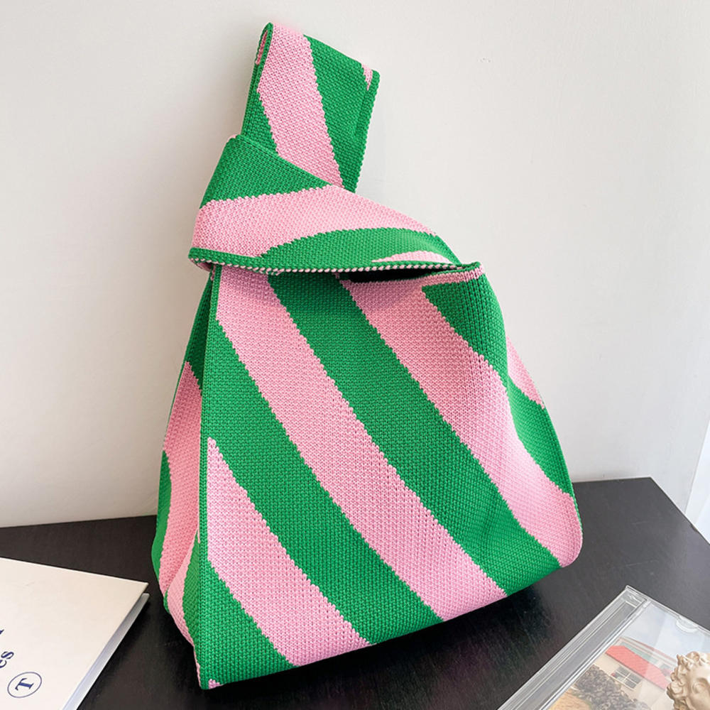 Polka dot stripe knit handbag.