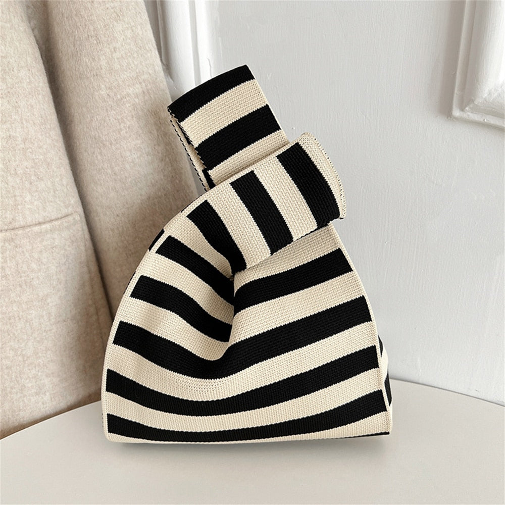 Polka dot stripe knit handbag.