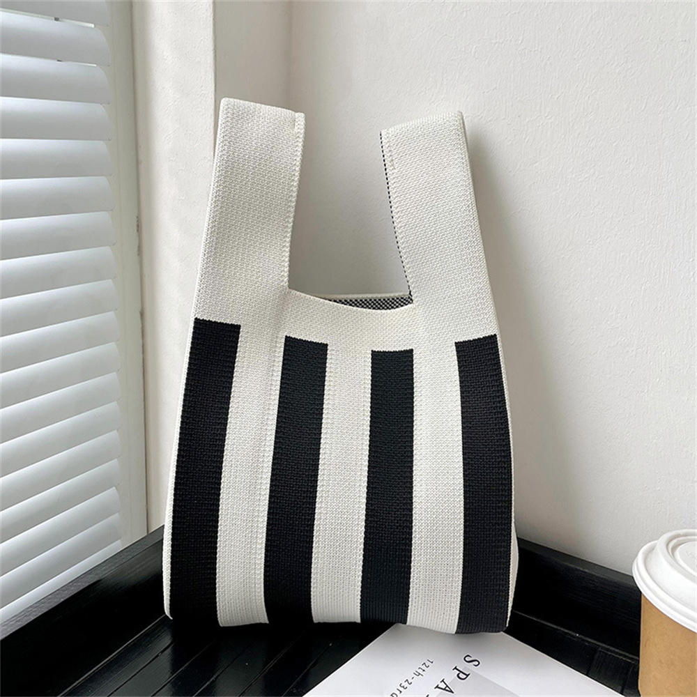 Polka dot stripe knit handbag.