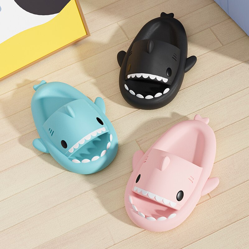 Shark platform slippers for comfort.